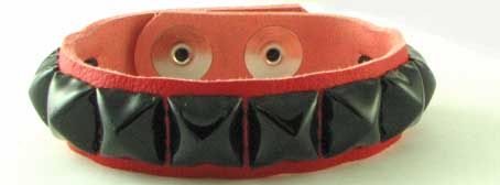 bracelets - Red veg - 1 row 1/2" std. blk. pyr. studs